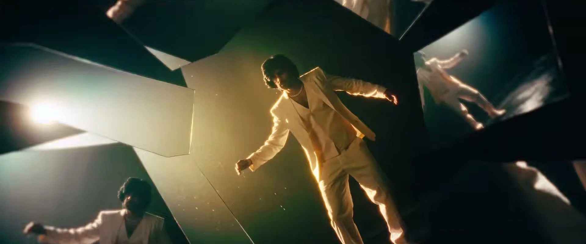 Vivasvaan in a white-suited performance